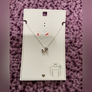 Silver costume jewelry with M initial